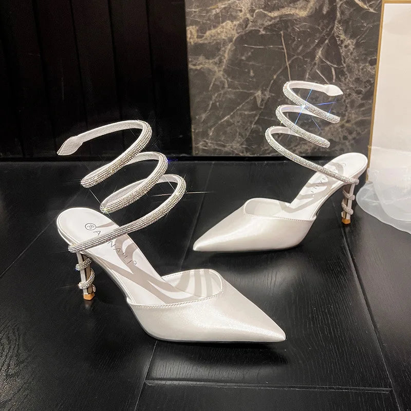 Snake shaped wrapped rhinestone suede pointed high heels